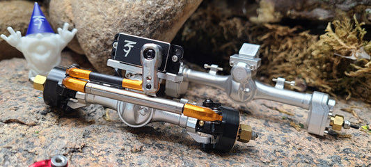 Shown installed on MEUS V2 axles and 3FLOW9 RC Torrent Servo and Stainless Steel Servo Horn are not included 